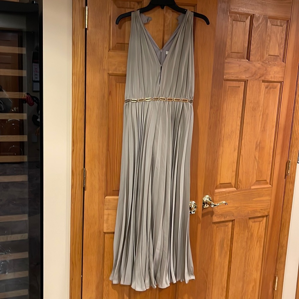 Halston pleated jumpsuit in a satiny metallic gold
